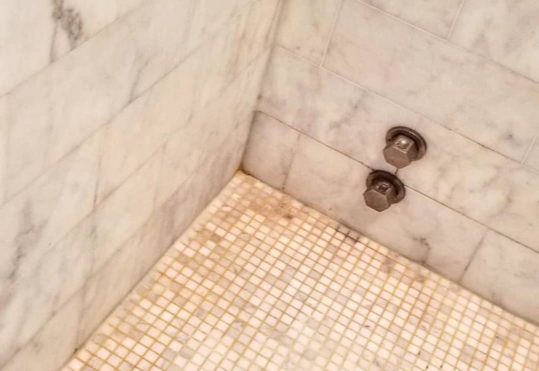 Marble shower cleaning before