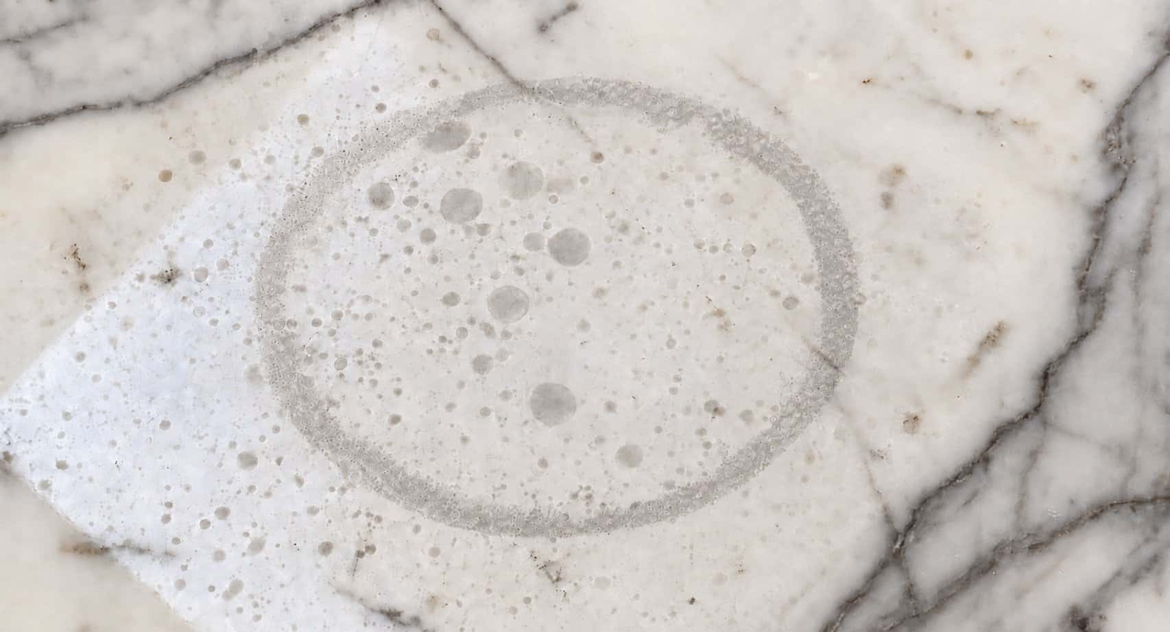 Etching pattern on marble countertop